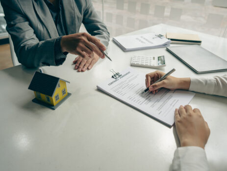 Two people discussing assets